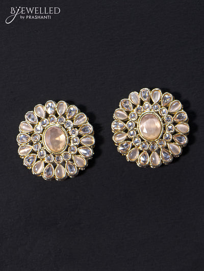 Light weight floral design earrings with cz and peach stone