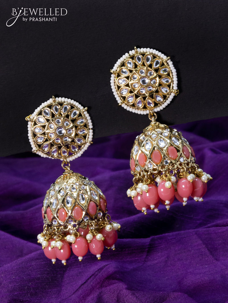 Light weight jhumkas peach pink and cz stone with beads hangings