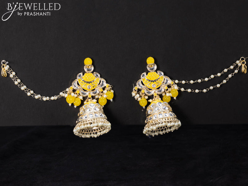 Light weight yellow jhumkas with kundan stones and pearl maatal