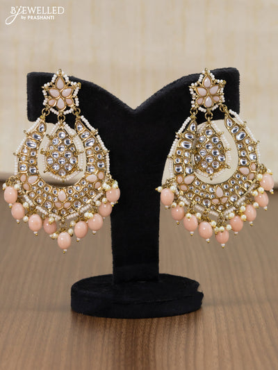 Light weight earrings peach and kundan stone with beads hangings