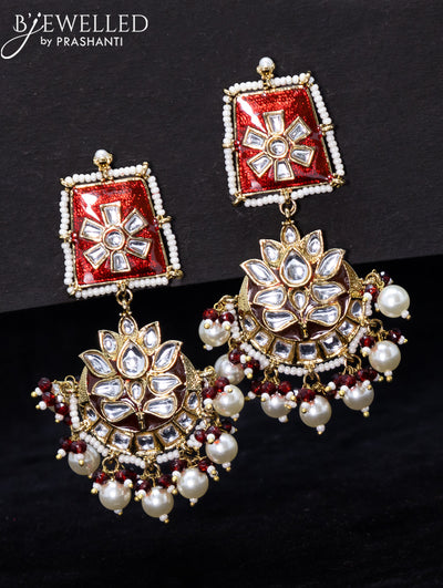 Light weight kundan stone earrings with maroon beads and pearl hangings