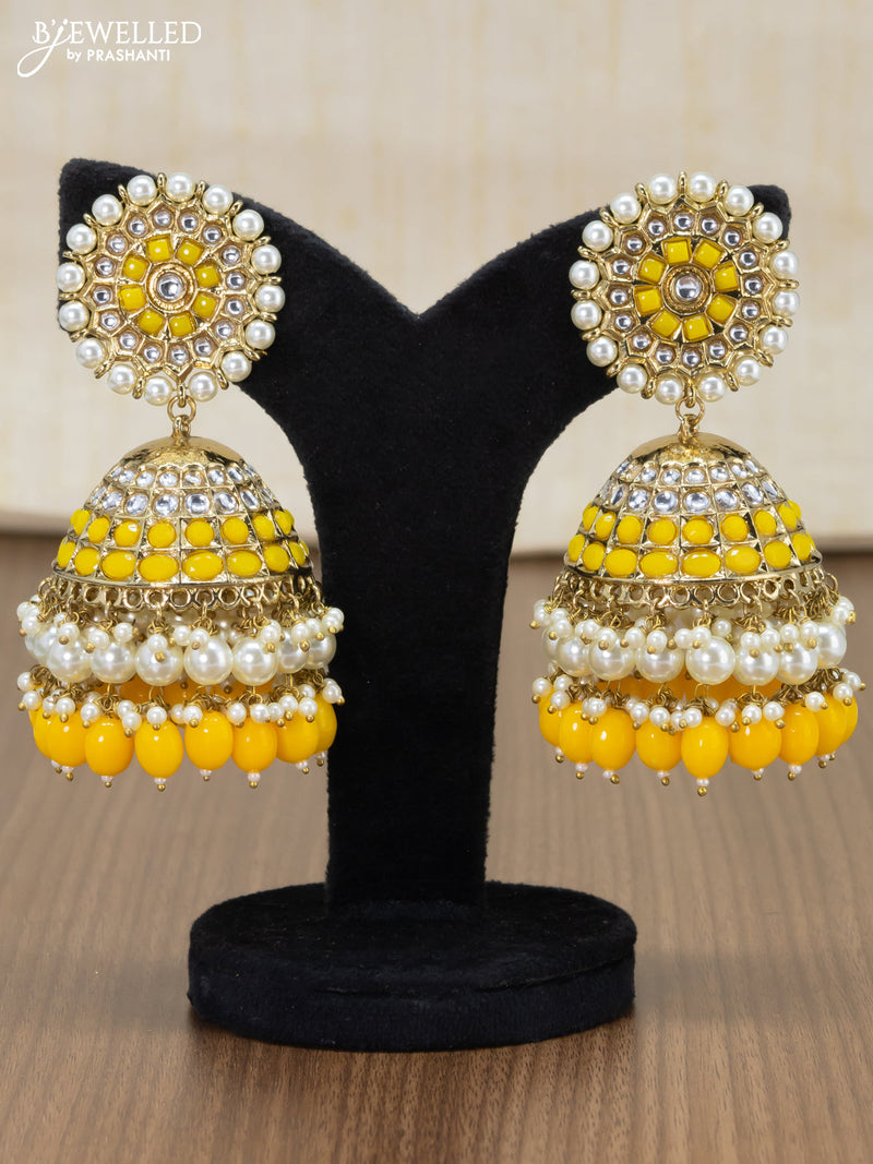 Light weight jhumka yellow and kundan stone with pearl maatal