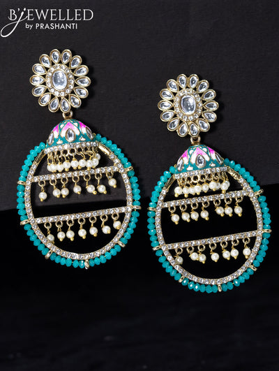 Light weight earrings with kundan stone and teal green crystal beads
