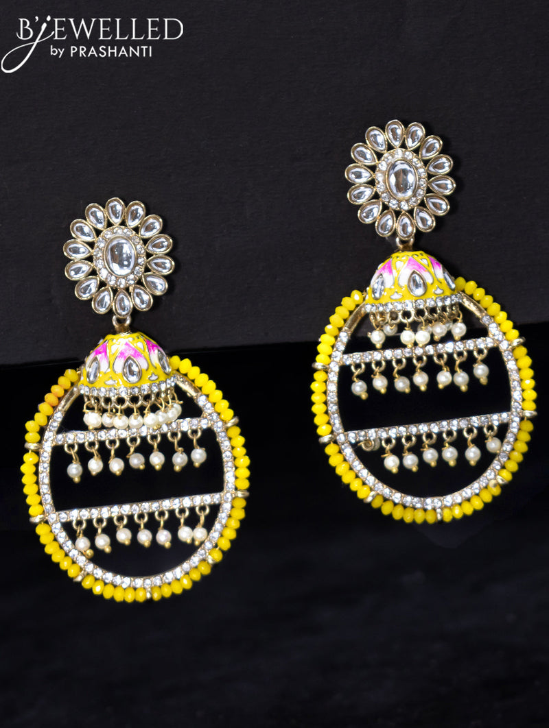 Light weight earrings with kundan stone and yellow crystal beads