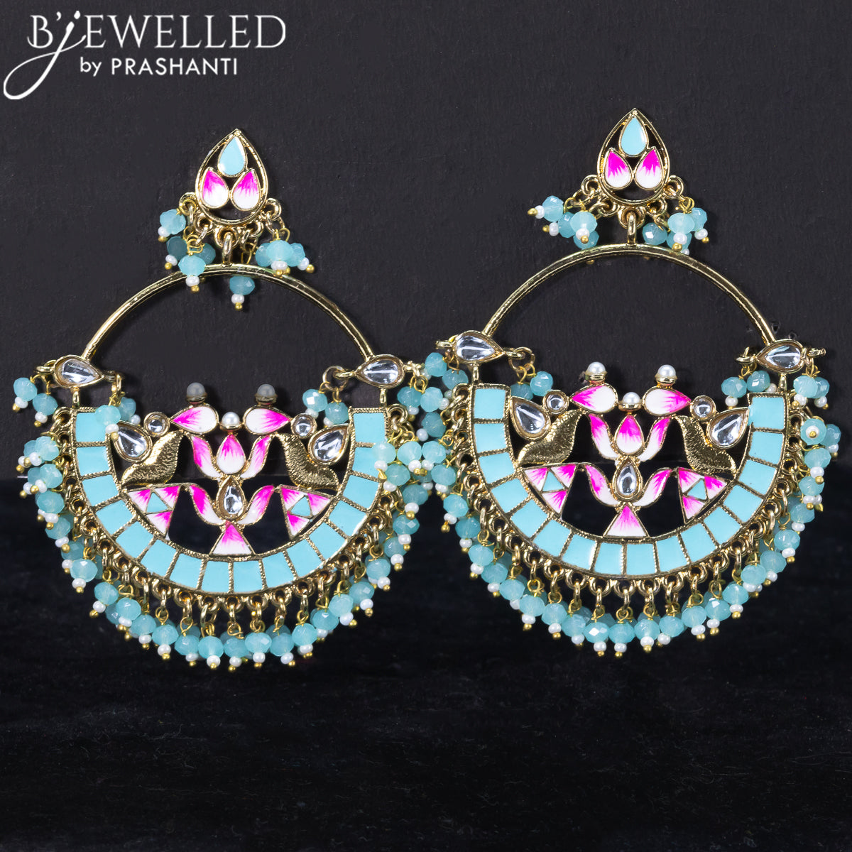 Light weight lotus design earrings with cz stone and light blue beads hangings