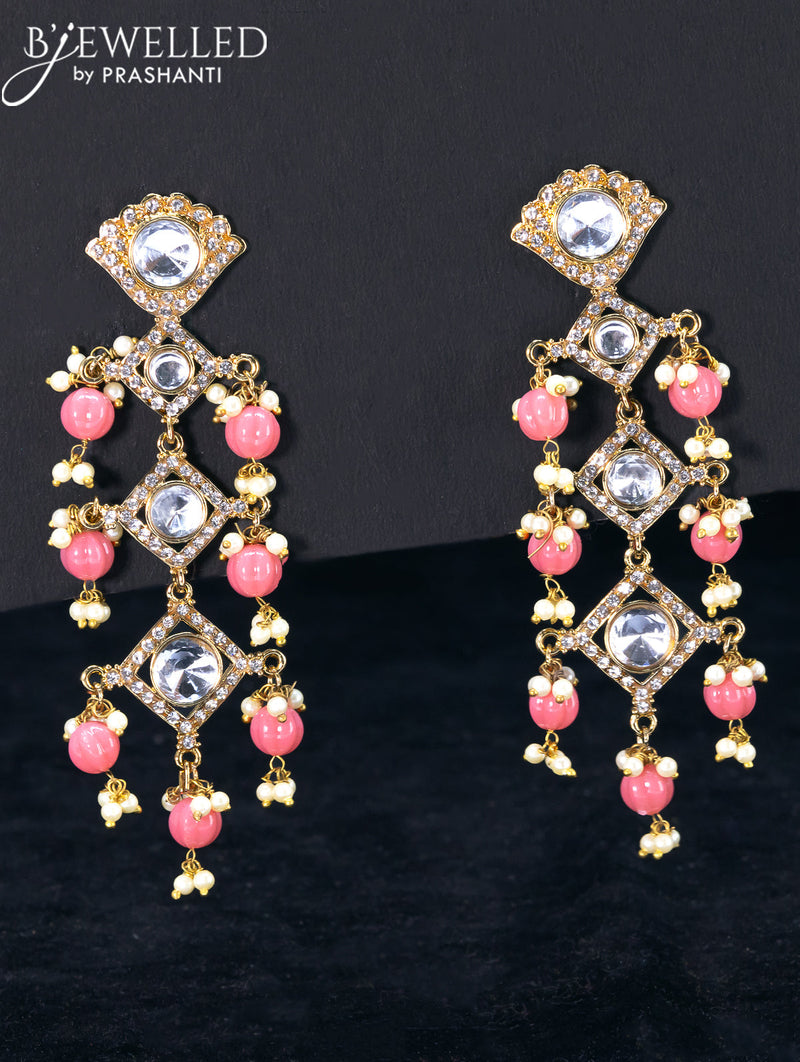 Light weight earrings with cz stone and peach beads hangings