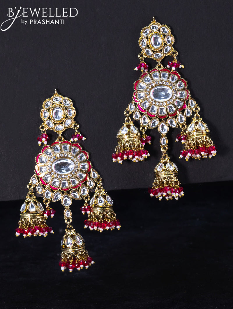 Light weight jhumka with kundan stones and pink beads hangings
