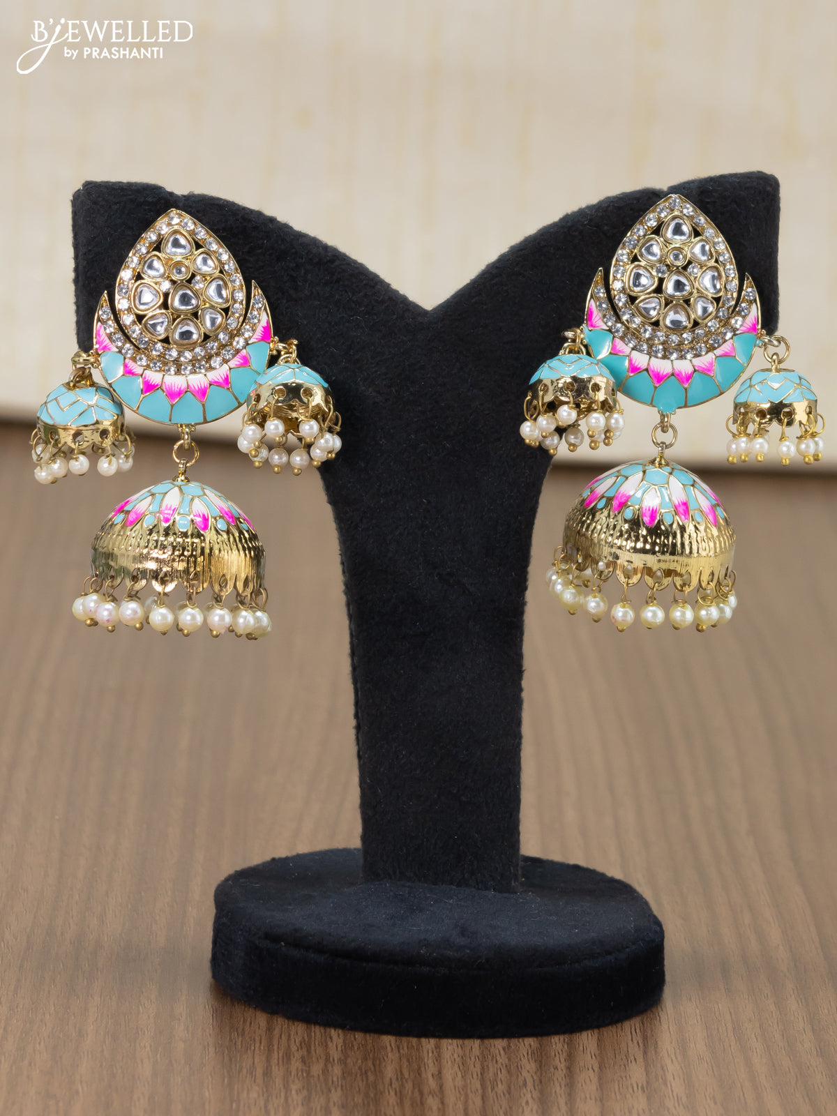 Light weight jhumka with light blue minakari and pearl hangings