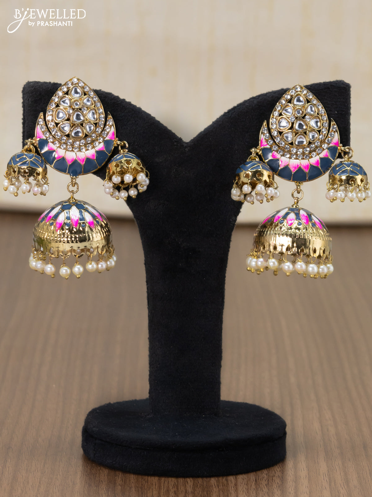 Light weight jhumka with blue minakari and pearl hangings