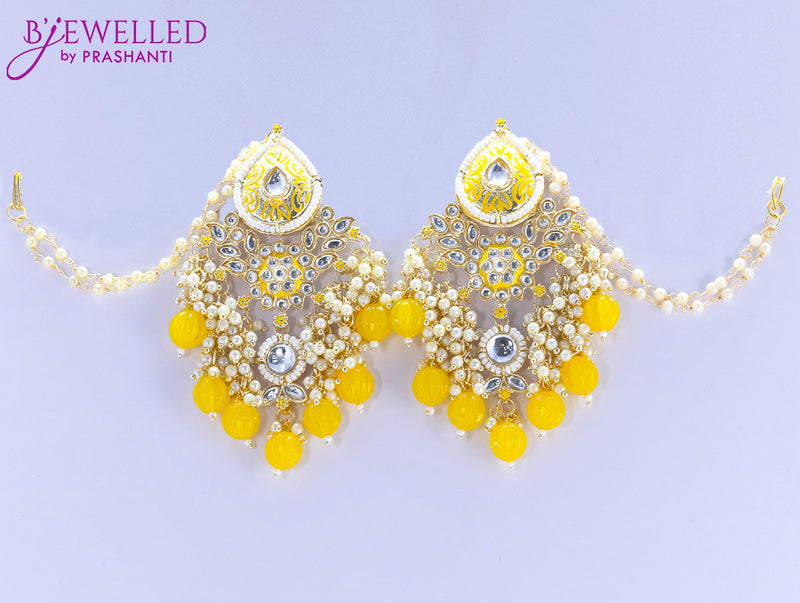 Dangler yellow earrings with hangings and pearl maatal