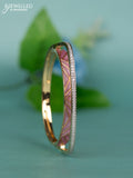 Zircon bracelet with light pink enamal and cz stones in gold finish