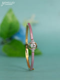 Zircon bracelet with light pink enamal and cz stones in gold finish