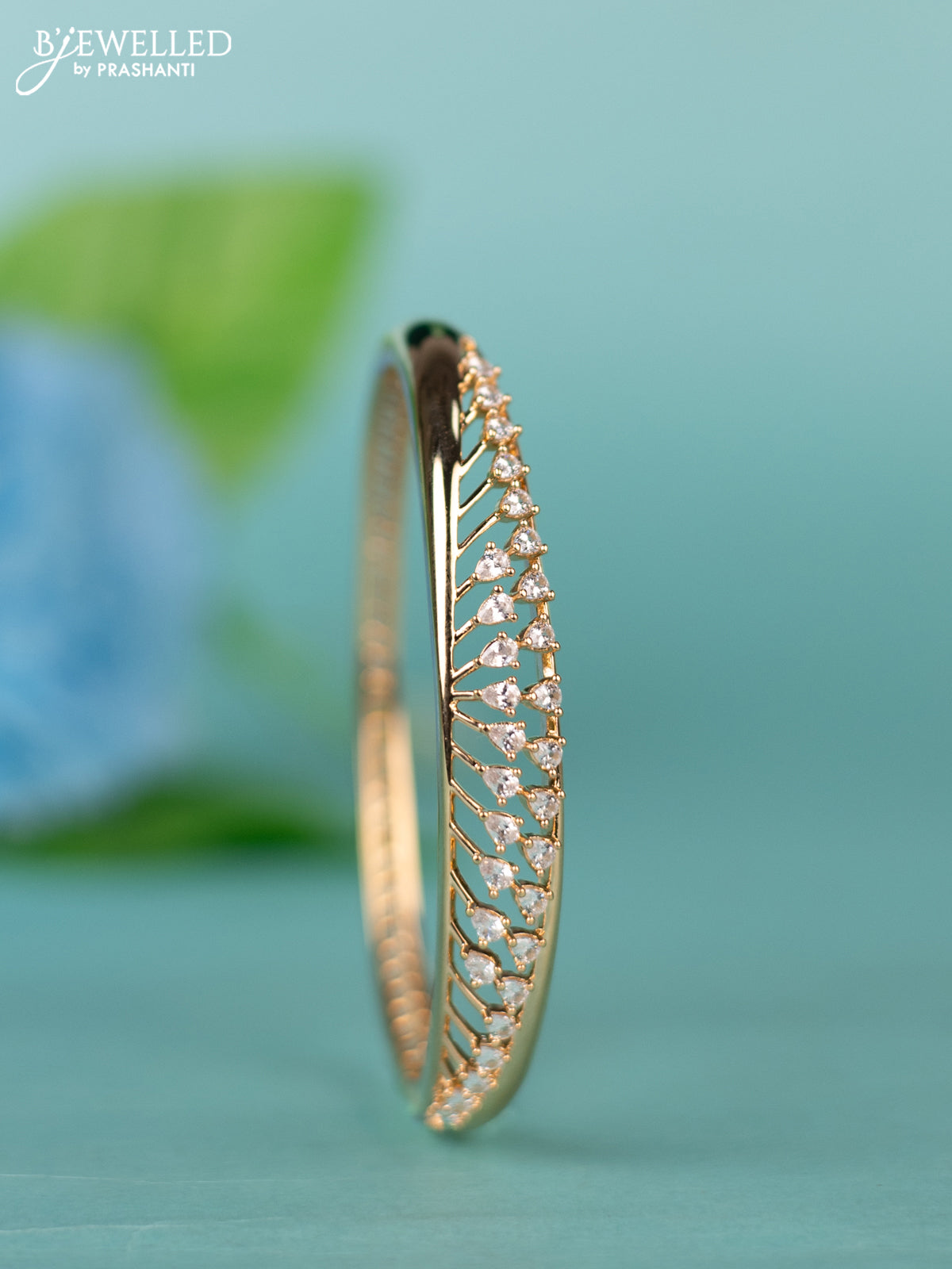 Zircon bracelet with cz stones in gold finish