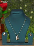 Gold chain with ice blue enamal and cz stones pendant