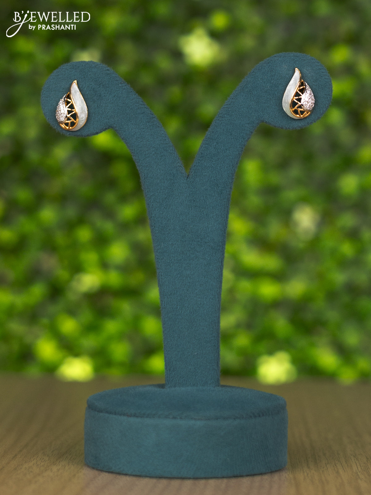 Gold chain with ice blue enamal and cz stones pendant