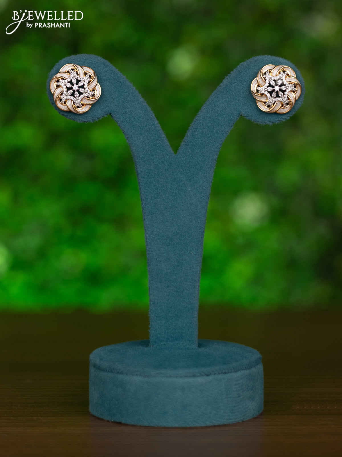 Gold chain with white enamel and cz stones pendant