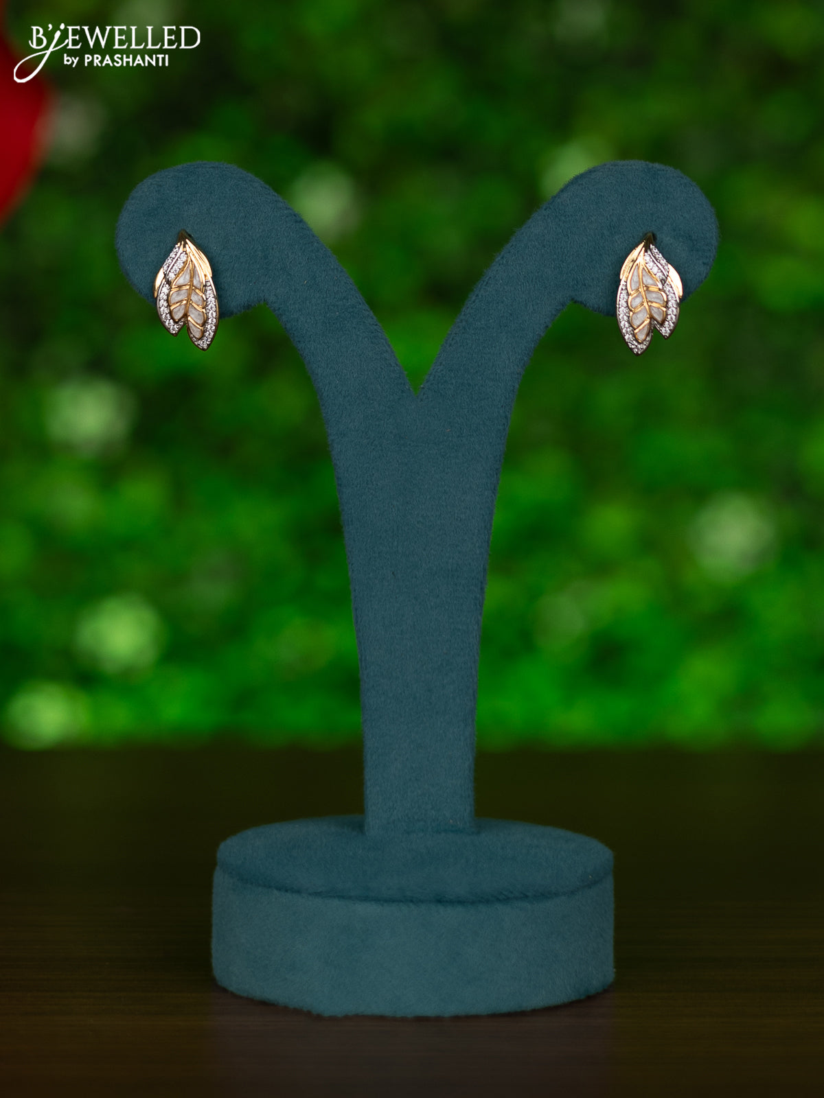 Gold chain leaf design with white enamel and cz stones pendant