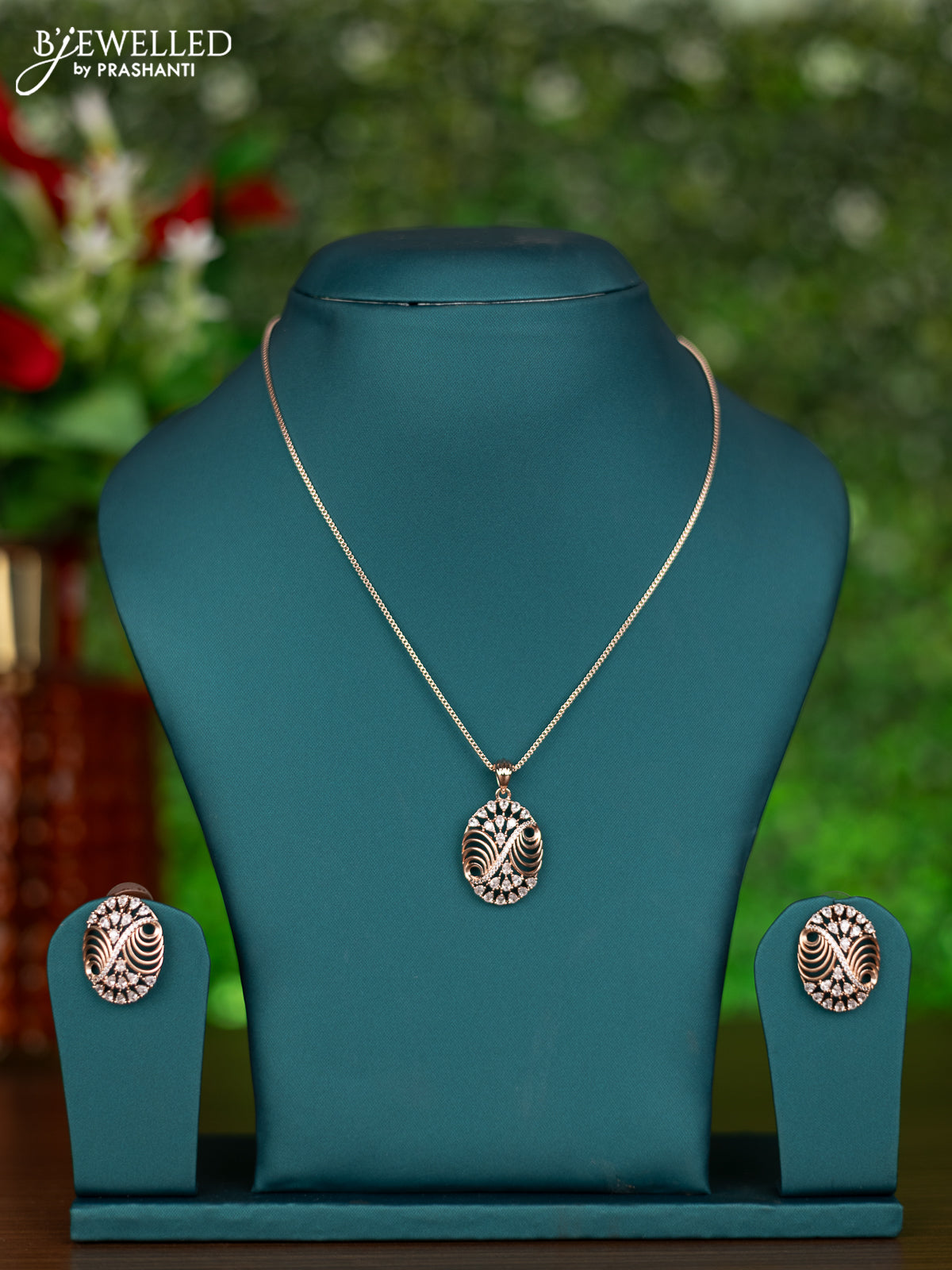 Rose gold chain with cz stones pendant