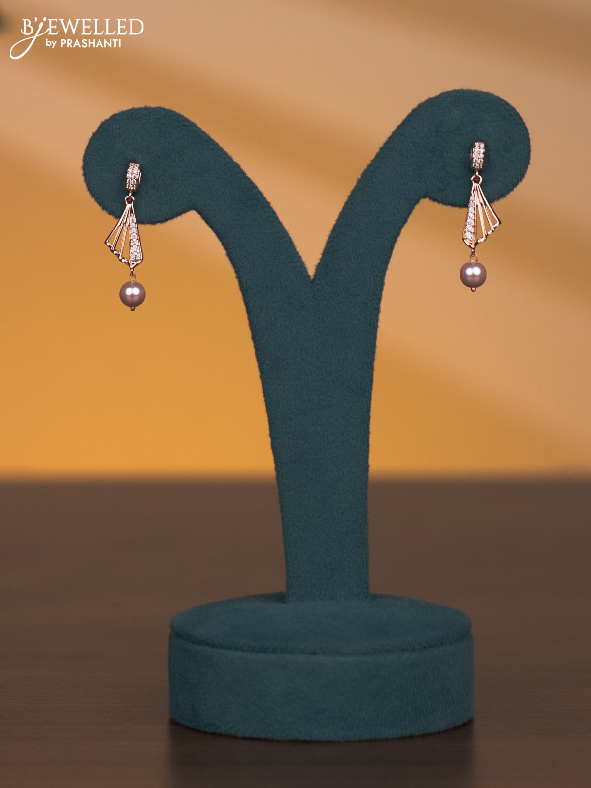 Rose gold necklace with cz stones and pearl hanging