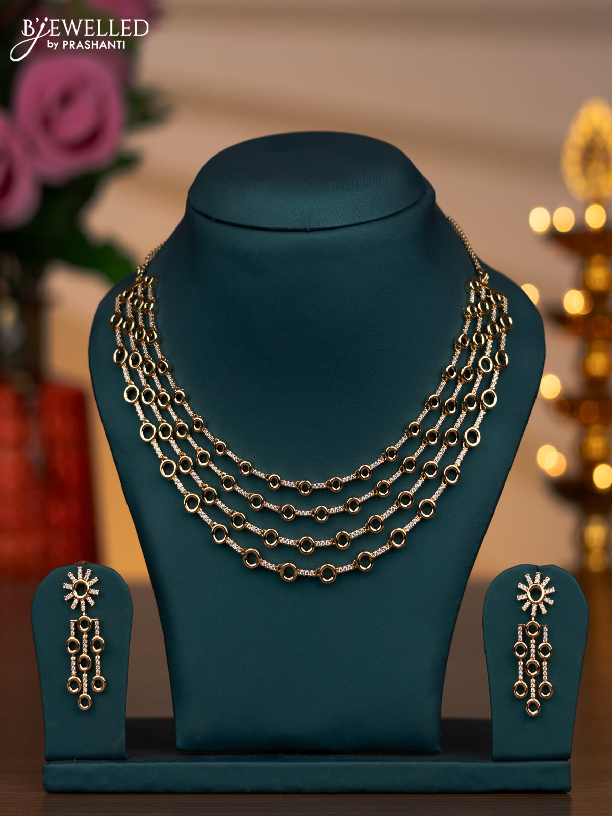 Zircon multilayer necklace with cz stones in gold finish