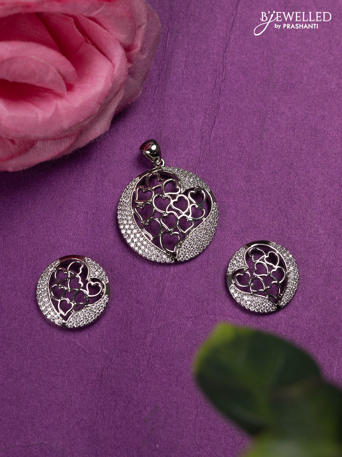 Zircon pendant set with cz stones