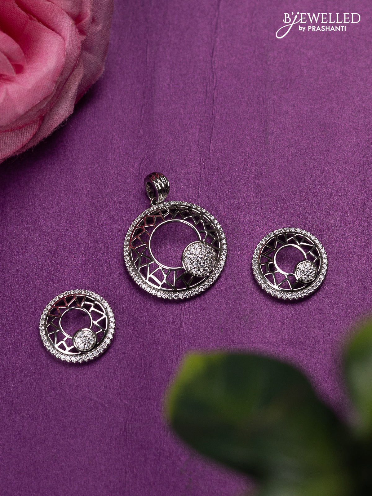 Zircon pendant set with cz stones