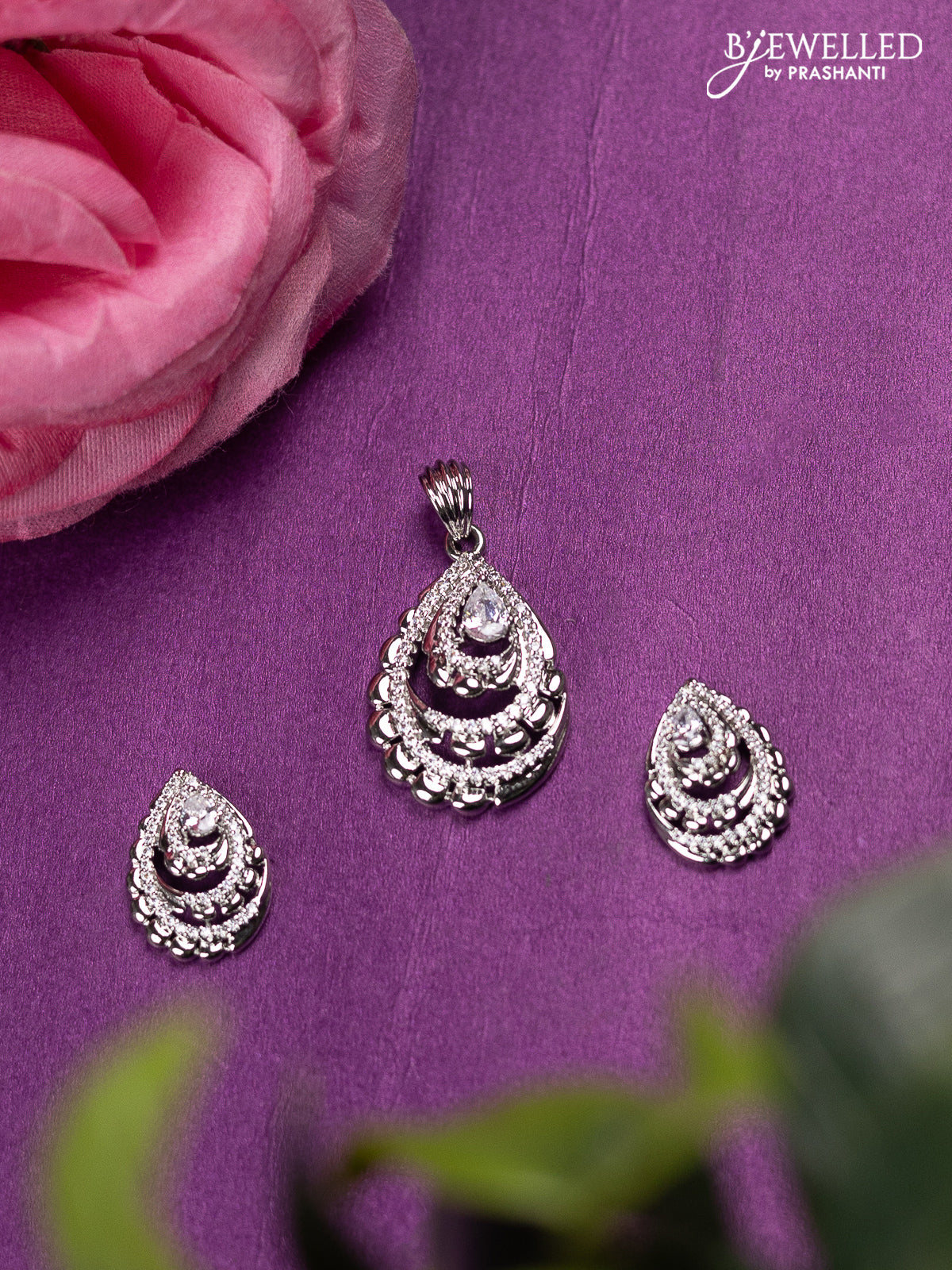 Zircon pendant set with cz stones