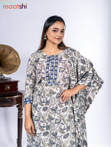 Cotton salwar suit beige and blue with allover kalamkari prints & corcia lace work neck pattern and straight cut pant & dupatta