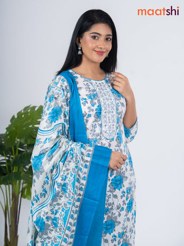 Semi cotton salwar suit off white and blue with allover floral prints & embroidery mirror work neck pattern and straight cut pant & dupatta