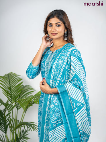 Semi cotton salwar suit teal blue and off white with allover floral prints & embroidery mirror work neck pattern and straight cut pant & dupatta