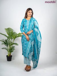 Semi cotton salwar suit teal blue and off white with allover floral prints & embroidery mirror work neck pattern and straight cut pant & dupatta