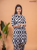 Cotton co-ord set off white and black with allover ikat weaves & simple neck pattern and straight cut pant