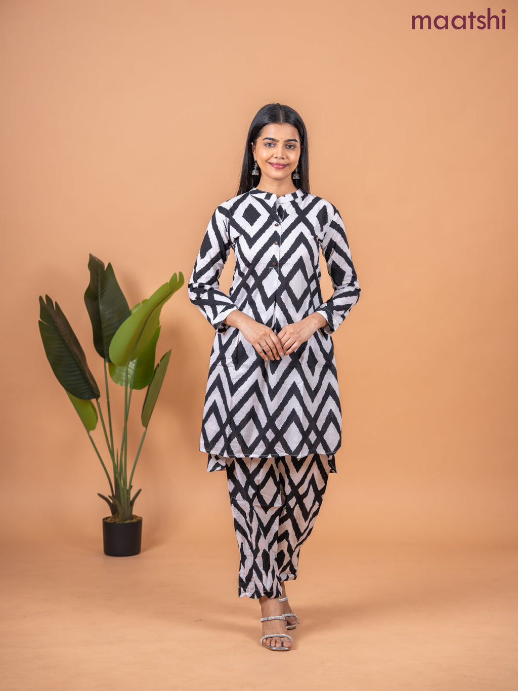 Cotton co-ord set off white and black with allover ikat weaves & simple neck pattern and straight cut pant