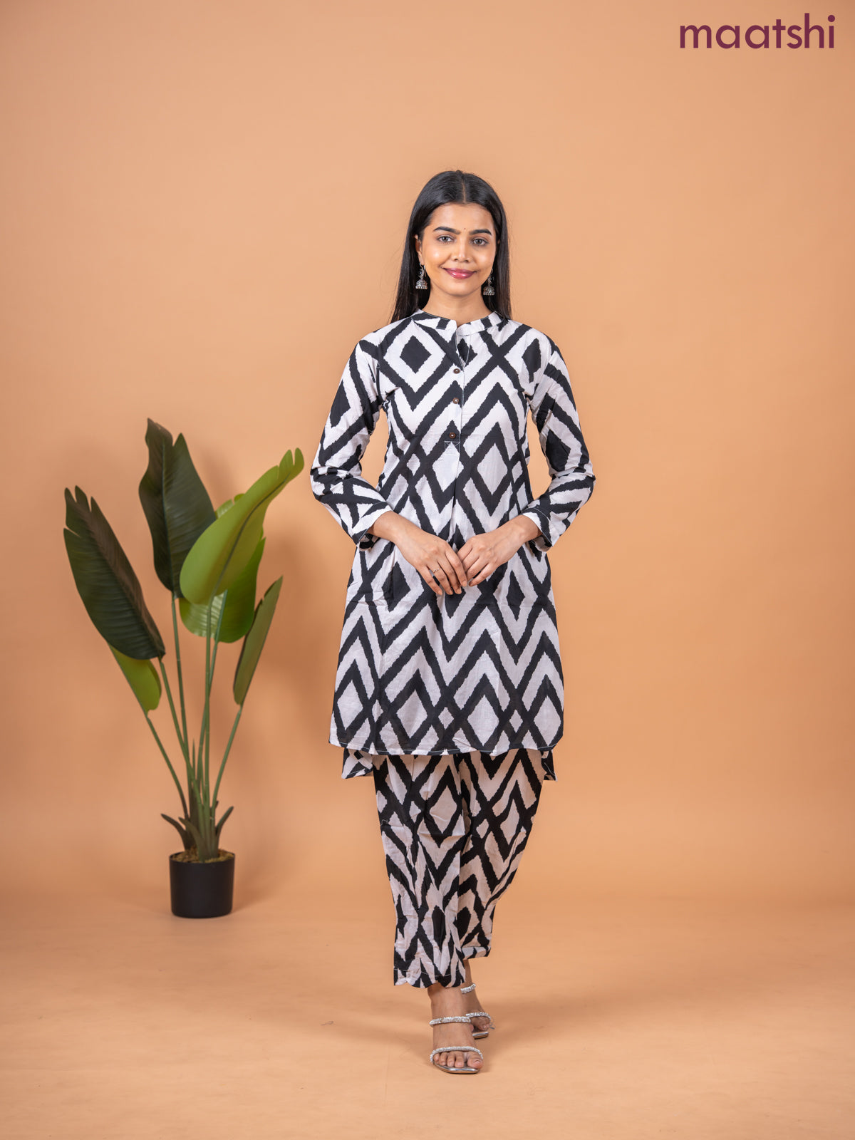 Cotton co-ord set off white and black with allover ikat weaves & simple neck pattern and straight cut pant