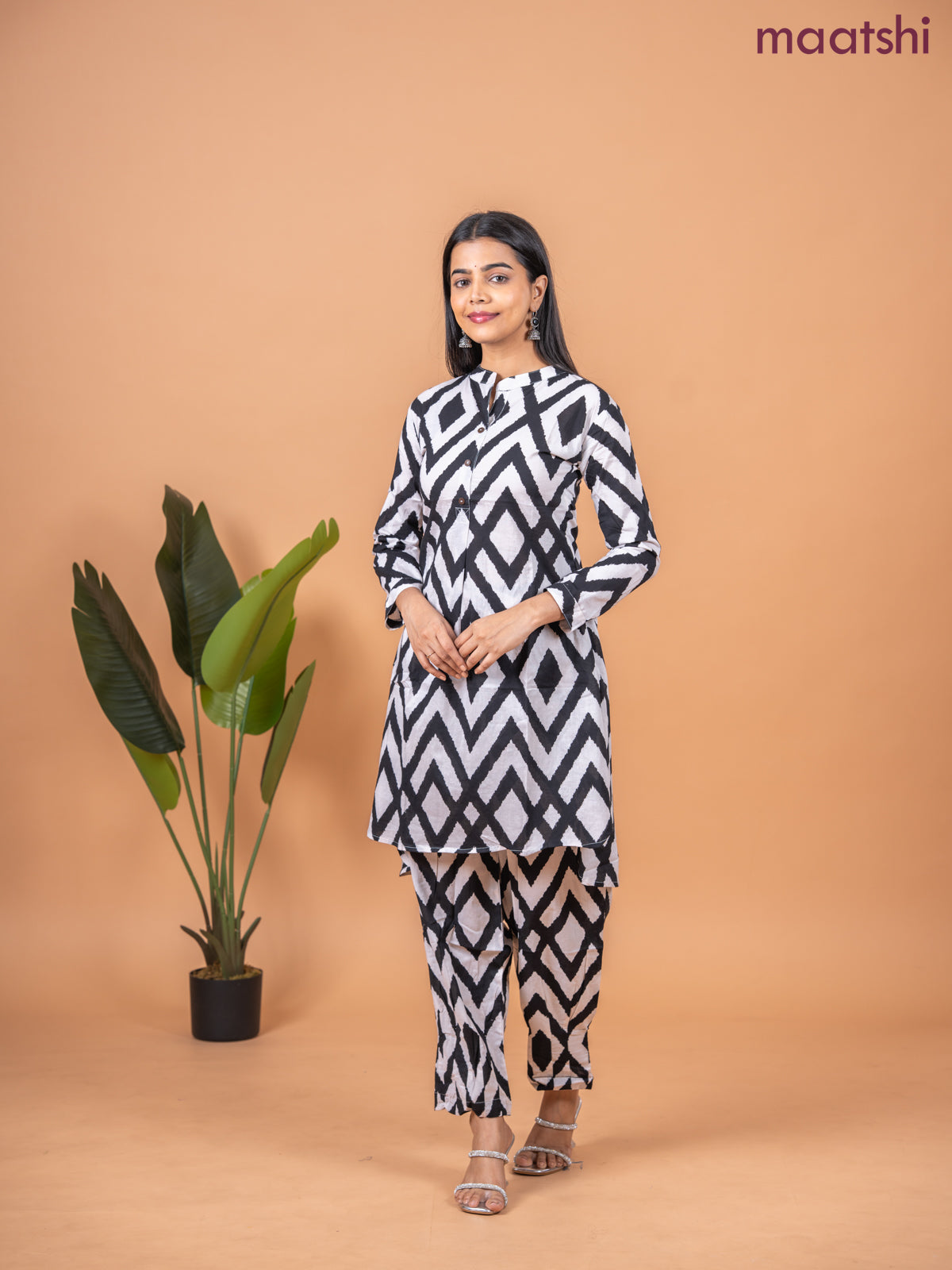 Cotton co-ord set off white and black with allover ikat weaves & simple neck pattern and straight cut pant