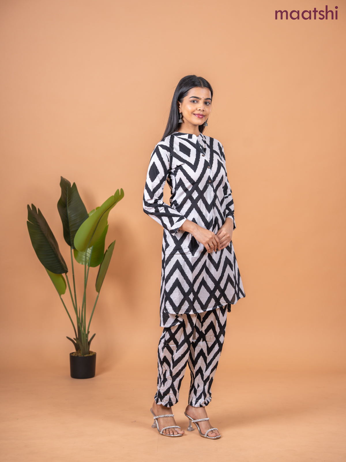 Cotton co-ord set off white and black with allover ikat weaves & simple neck pattern and straight cut pant