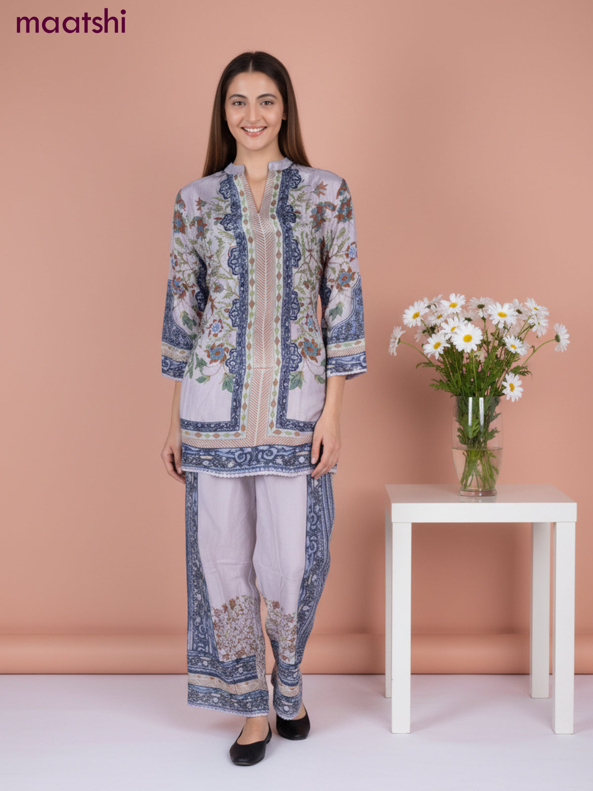 Short co-ord set pastel shade with allover prints & simple neck pattern and straight cut pant