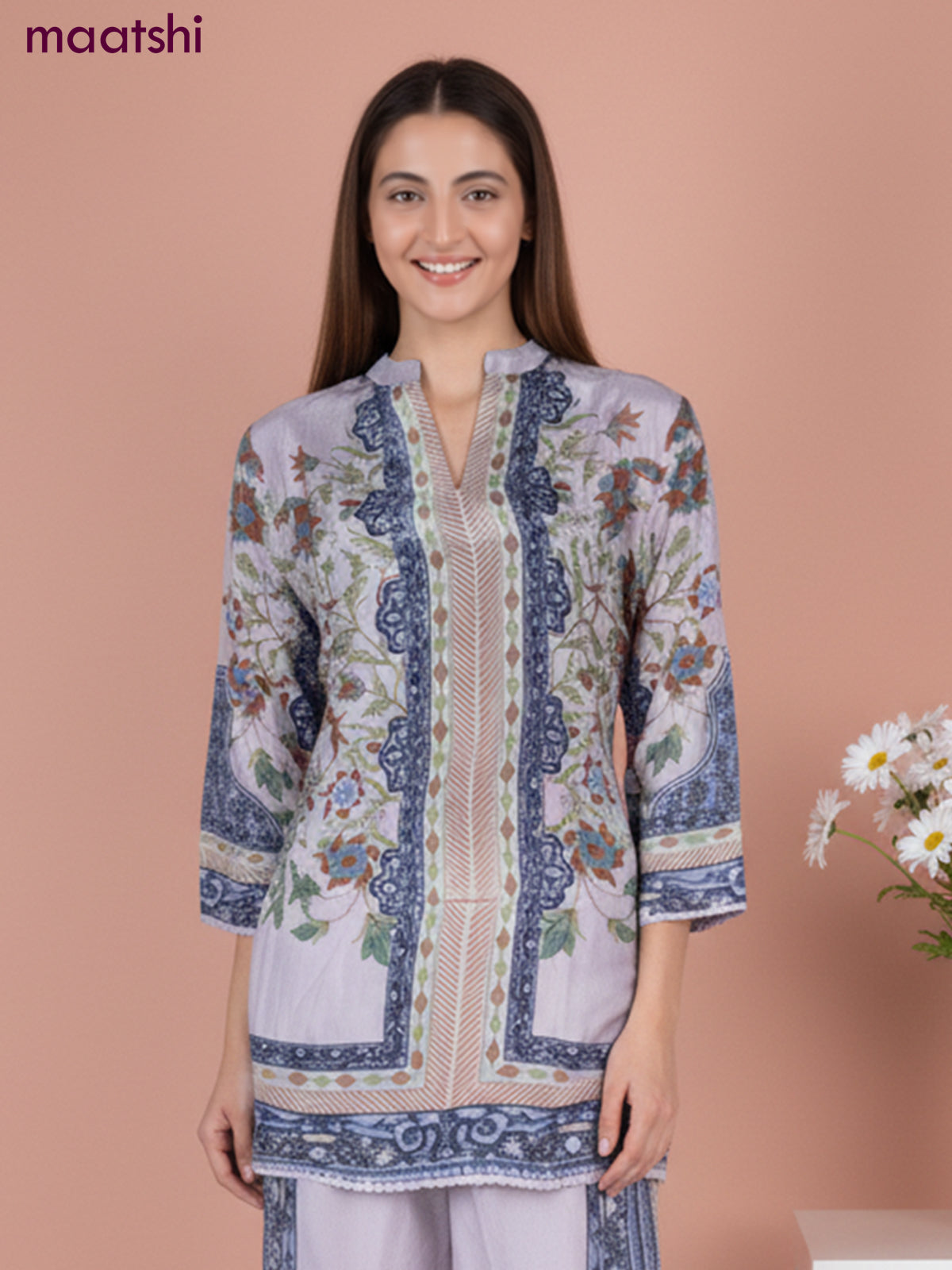 Short co-ord set pastel shade with allover prints & simple neck pattern and straight cut pant