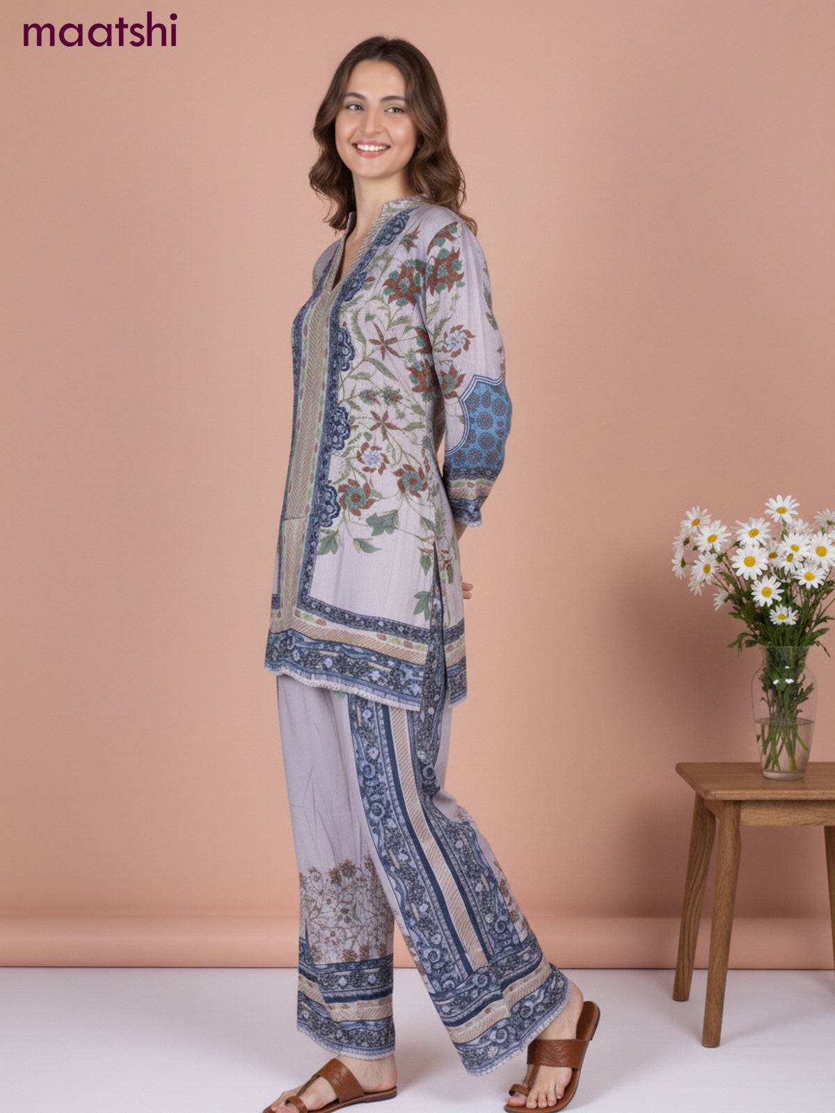 Short co-ord set pastel shade with allover prints & simple neck pattern and straight cut pant