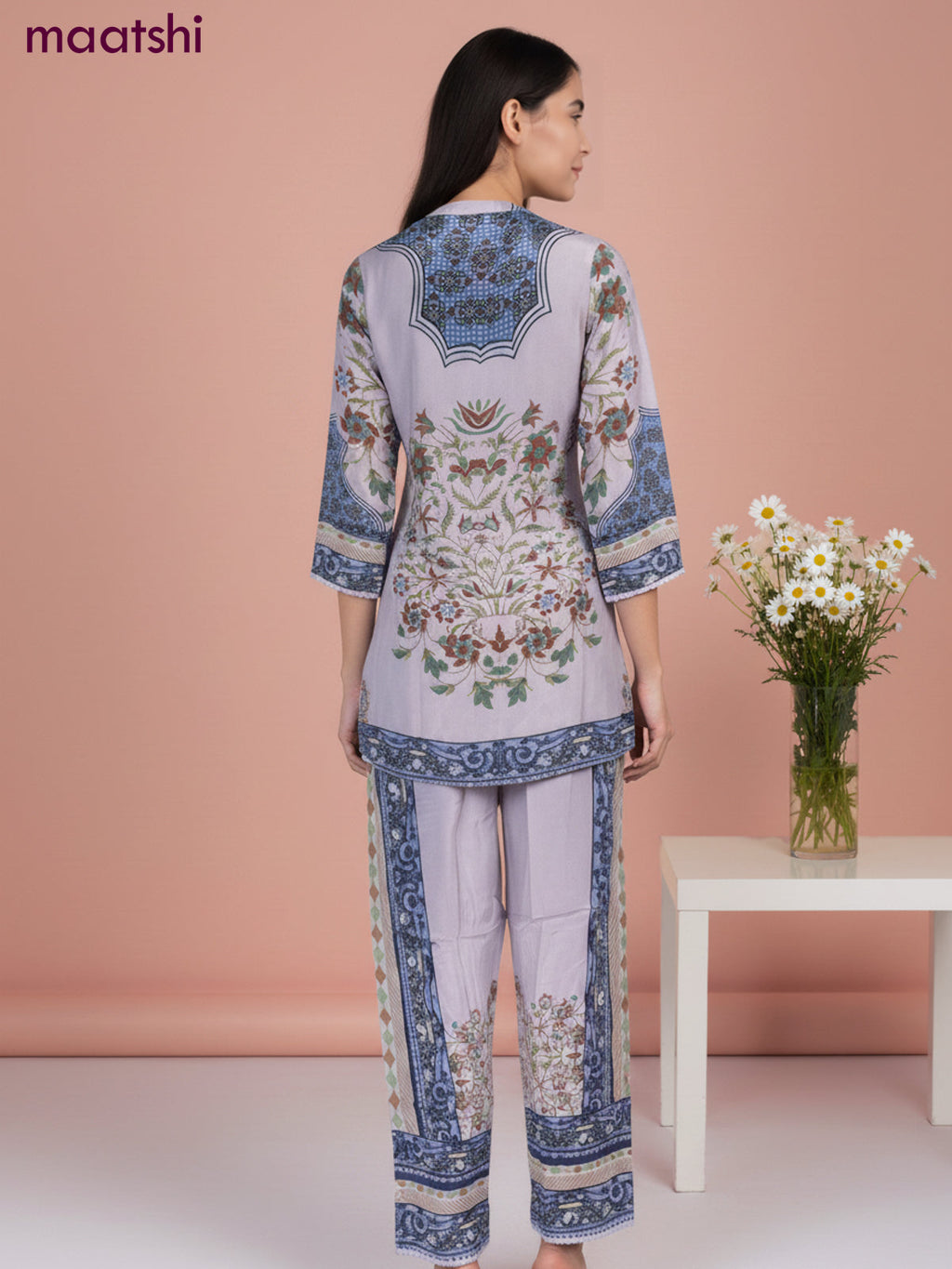 Short co-ord set pastel shade with allover prints & simple neck pattern and straight cut pant