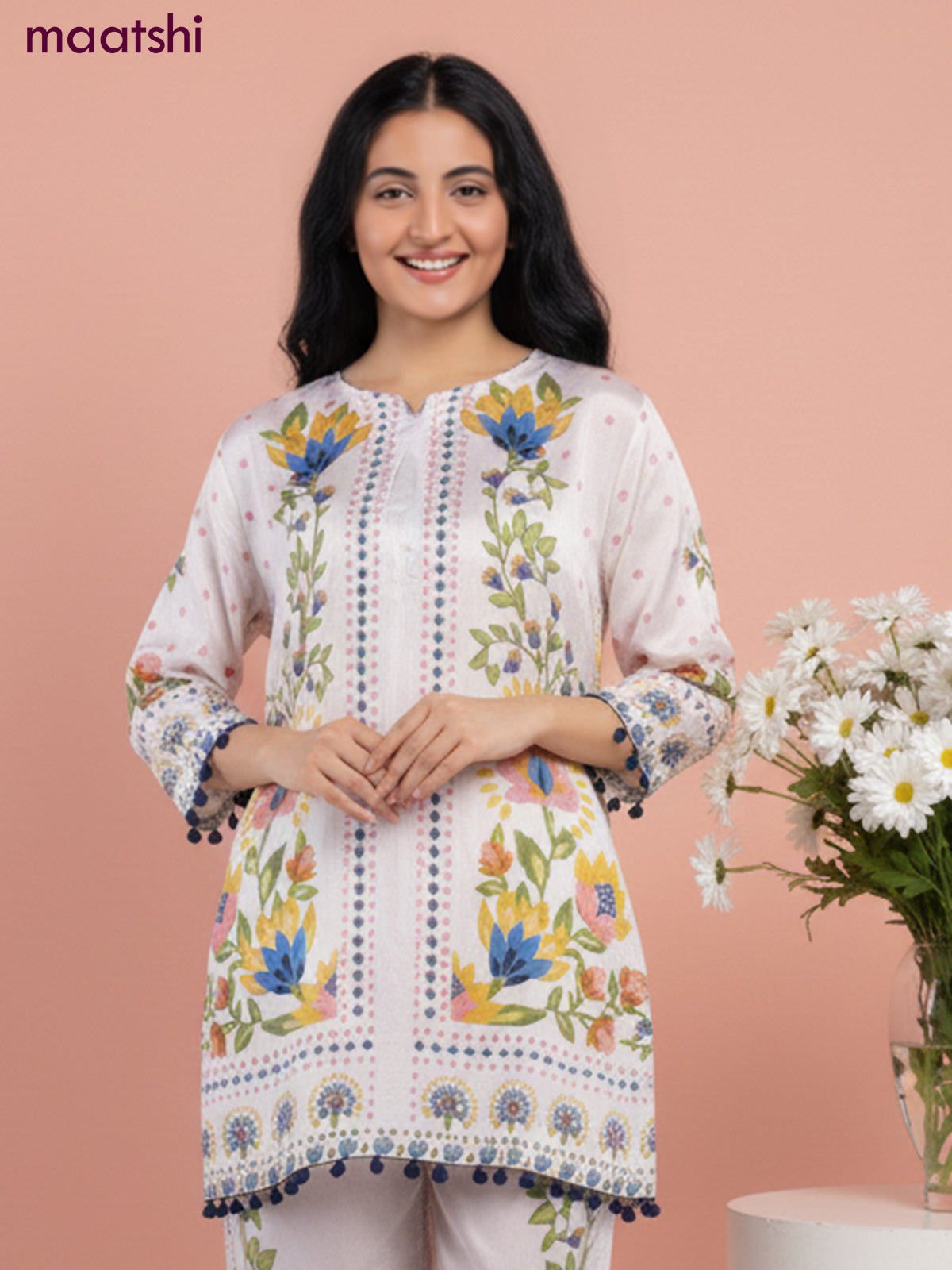 Short co-ord set mild peach shade with allover prints & simple neck pattern and straight cut pant