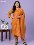 Dark Mustard and Orange Muslin Foral Printed Straight Suit