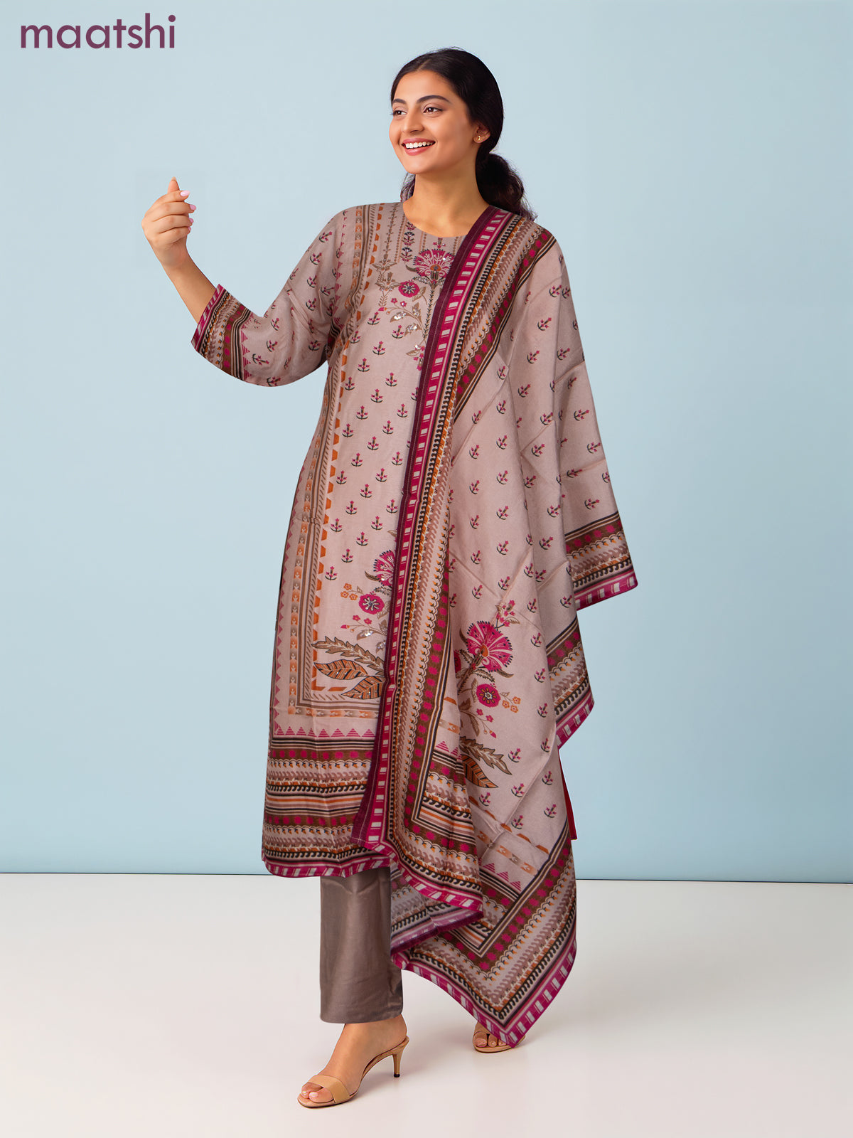 Muslin salwar suit peach shade with allover prints & sequin beaded work neck pattern and straight cut pant & dupatta