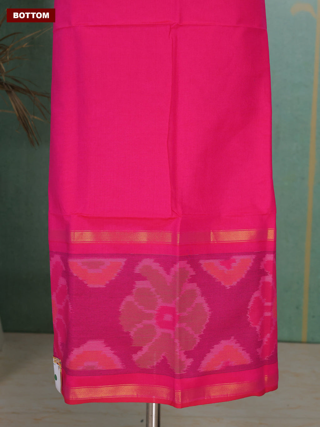 Rani Pink and Green Ikat Dress Material With Ikat Weaves