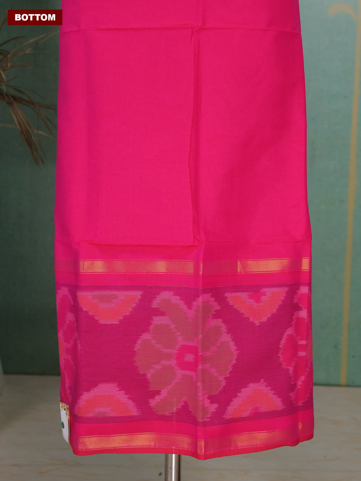 Rani Pink and Green Ikat Dress Material With Ikat Weaves