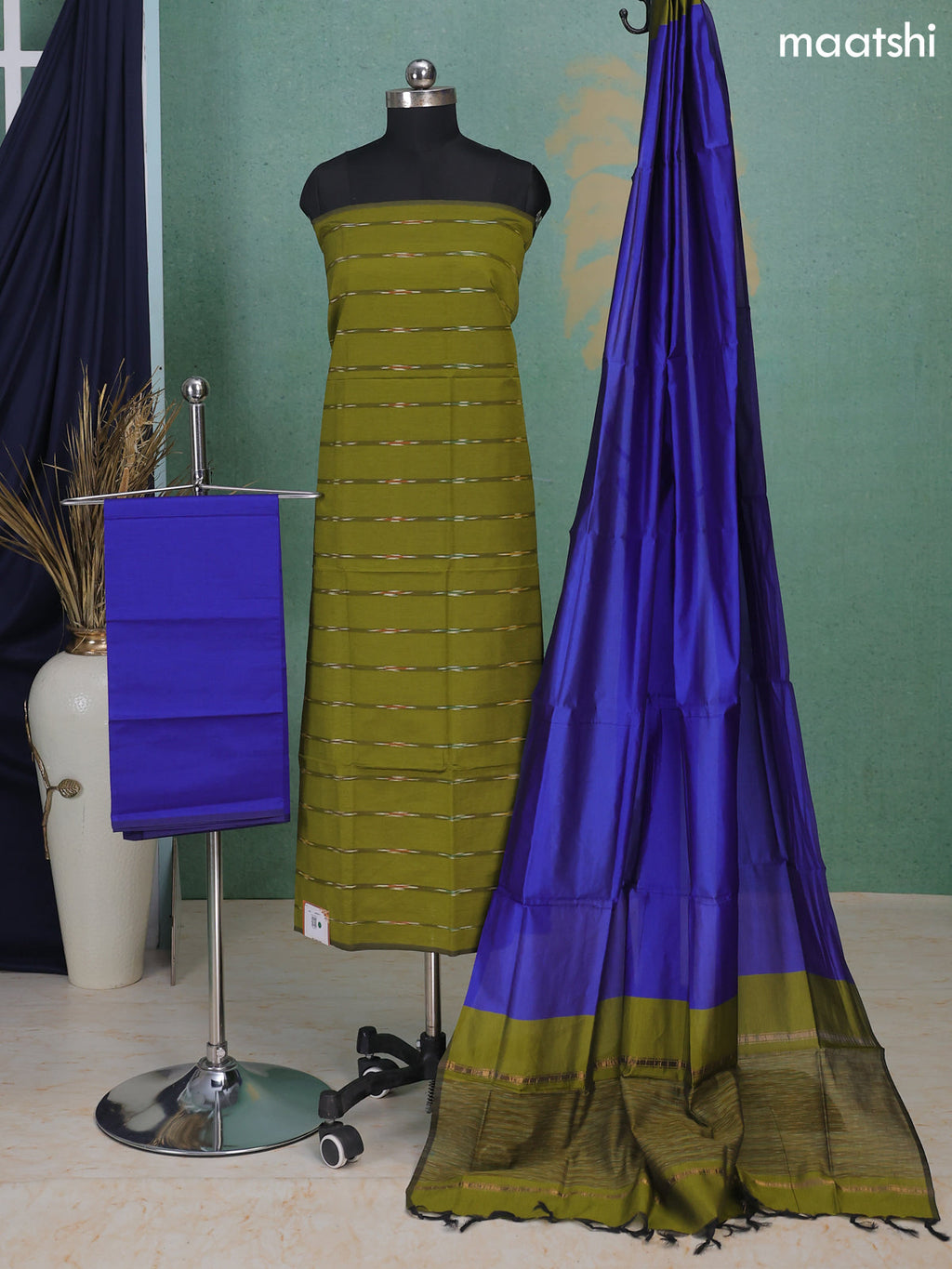 Mehandi Green and Indigo Blue Ikat Dress Material With Ikat Weaves