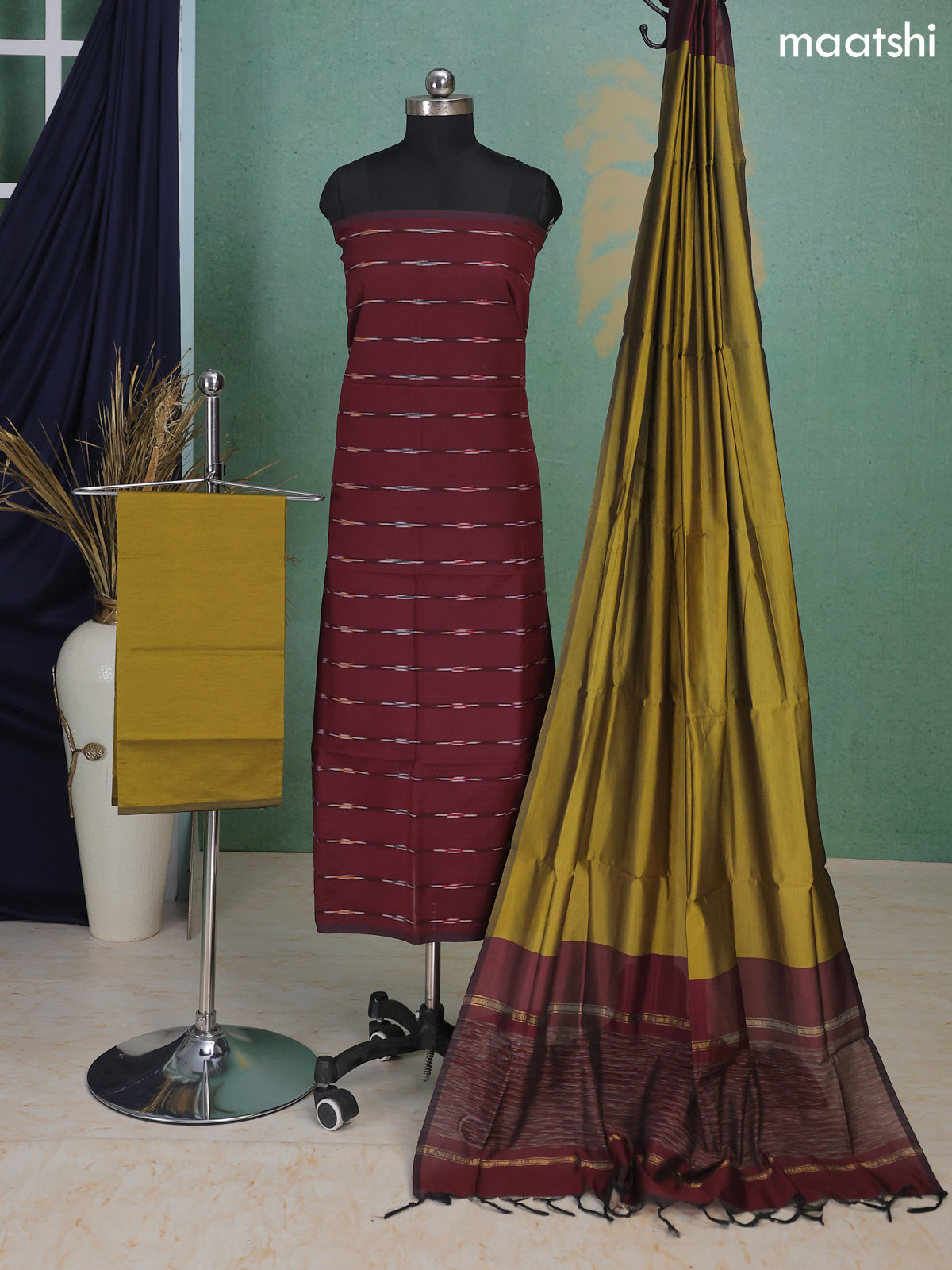 Deep Maroon and Mehandi Green Ikat Dress Material With Ikat Weaves