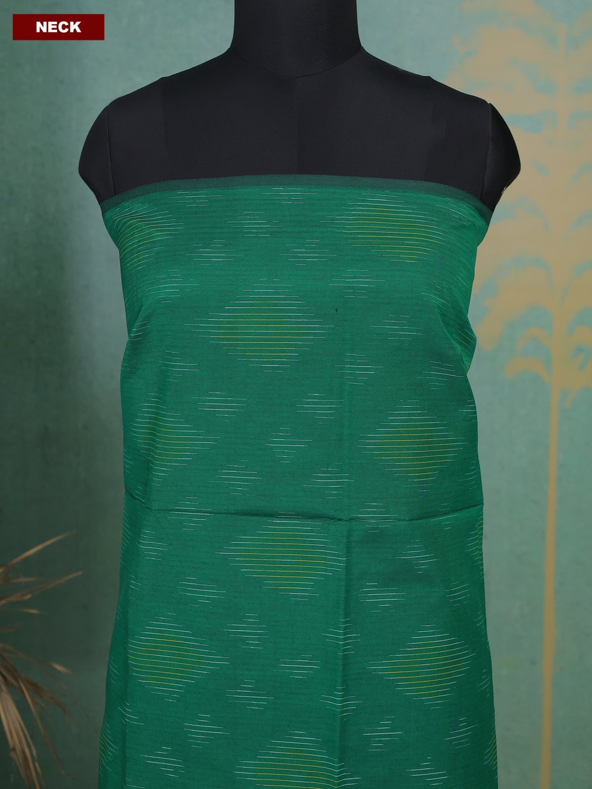 Dark Green and Mustard Yellow Ikat Dress Material With Ikat Weaves
