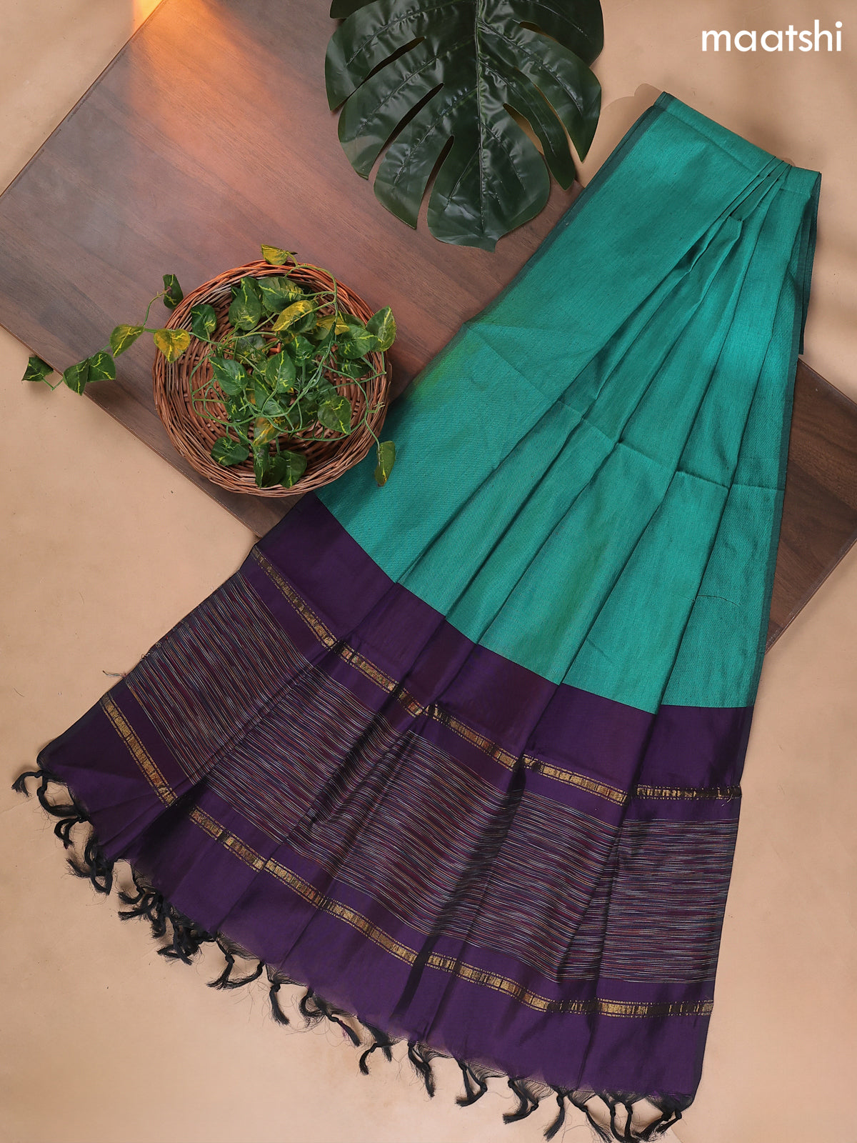 Deep Purple and Teal Green Ikat Dress Material With Ikat Weaves