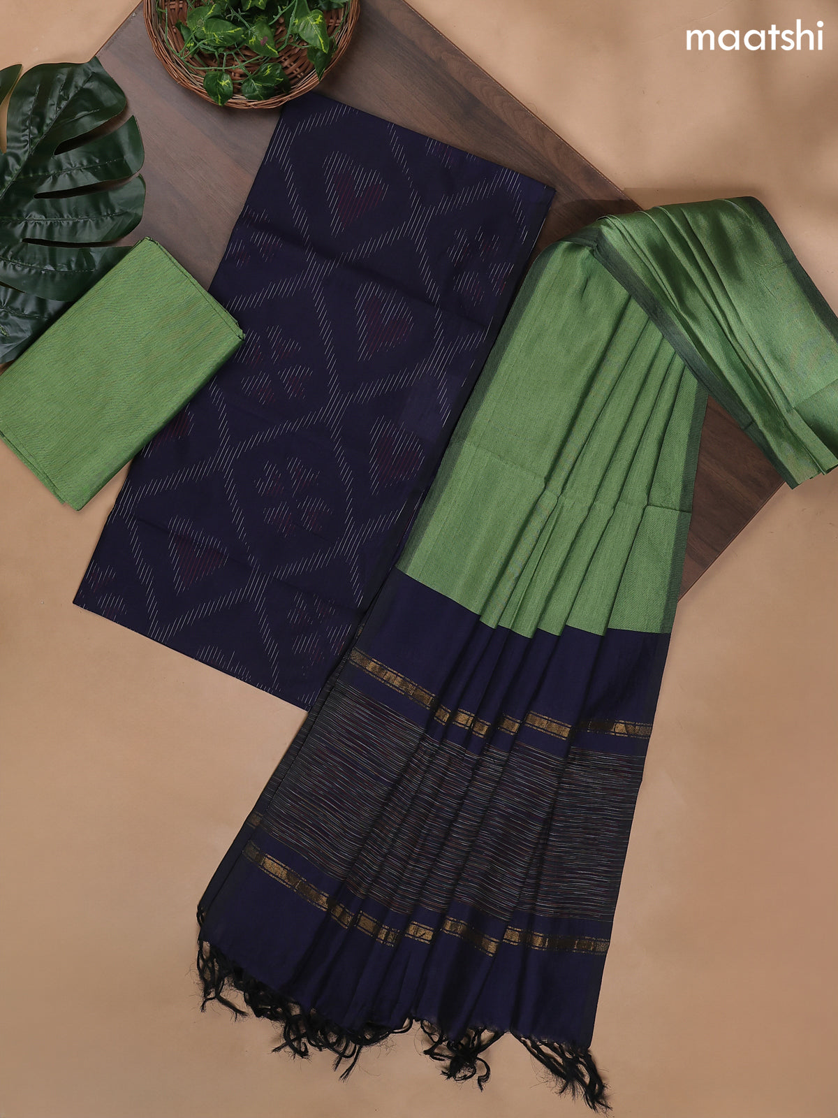 Navy Blue and Pastel Green Ikat Dress Material With Ikat Weaves